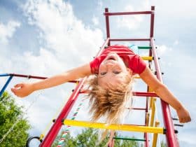 baby loves hanging upside down